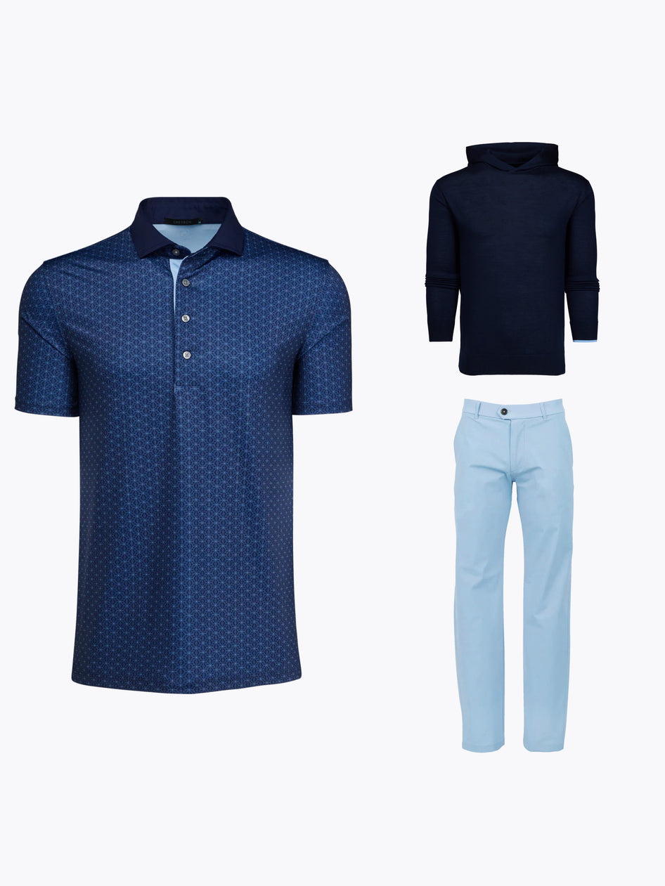 Shane Lowry US Open Thursday Outfit - Navy Print Polo, Navy Hoodie, Light Blue Trousers - Flat Lay | Greyson Clothiers