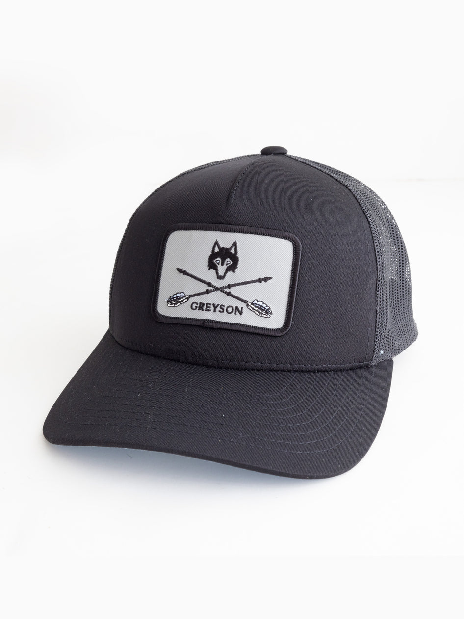 Shepherd Arrow Wolf Trucker Hat - Side View, Wolf Patch Logo | Greyson Clothiers