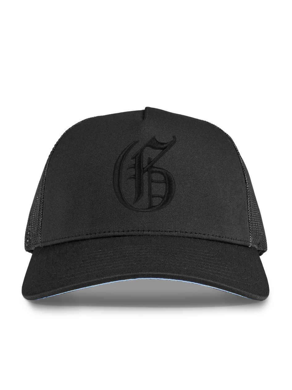 Black Polyester Gothic G Snapback Trucker Hat - Front View | Greyson Clothiers