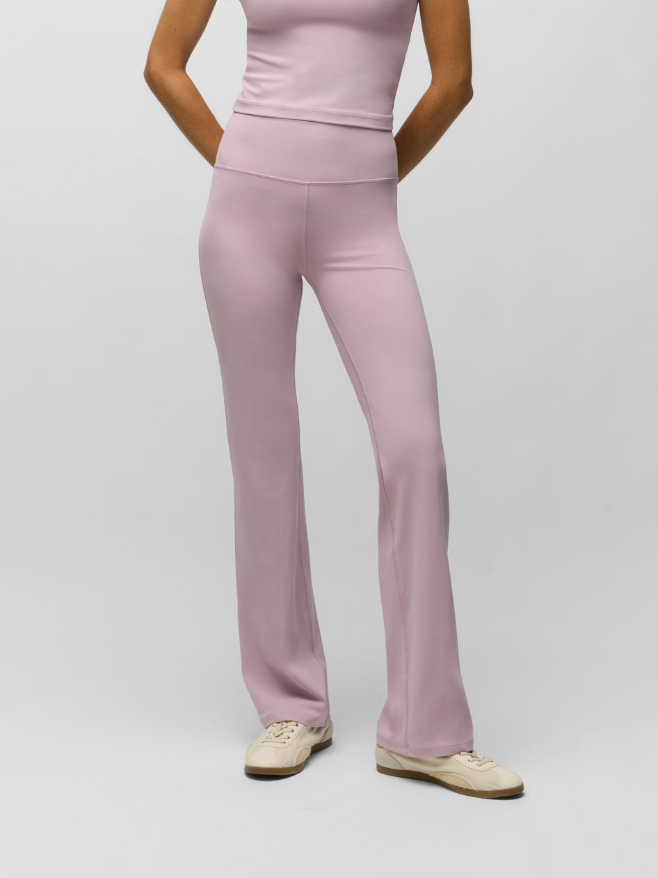 Dawn Pink Stretch Flare Legging Pant - Front View, High-Rise Waistband On Model | Greyson Clothiers